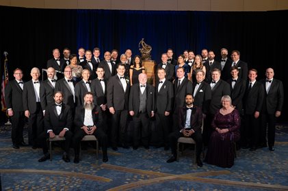 Members of NASA's Ingenuity Mars Helicopter team are pictured with the Collier Trophy, presented on June 9, 2022. Susan Gorton is seated front right. MiMi Aung is standing to the left of the 525-pound bronze trophy, which is on permanent display at the Smithsonianâ€™s National Air and Space Museum in Washington, D.C. Credit: National Aeronautic Association