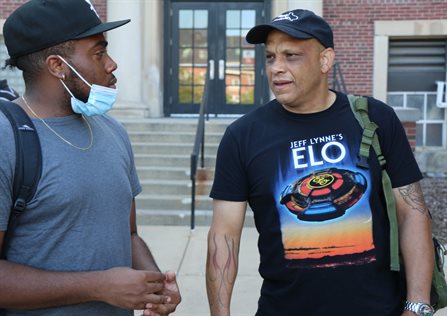 Kameron Jackson, BS '22 left, talking with Christopher Young, right, at a Minorities in Aerospace event.