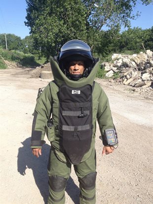 Young in bomb squad suit