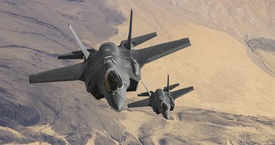 Flight of F-35s over the desert