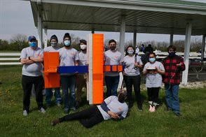 Design Build Fly team photo. Prof. Jason Merret left. Herena, third from right.