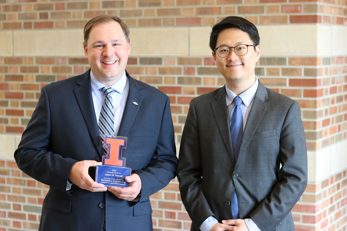 Jason M. Merret with AIAA President Noah Jon