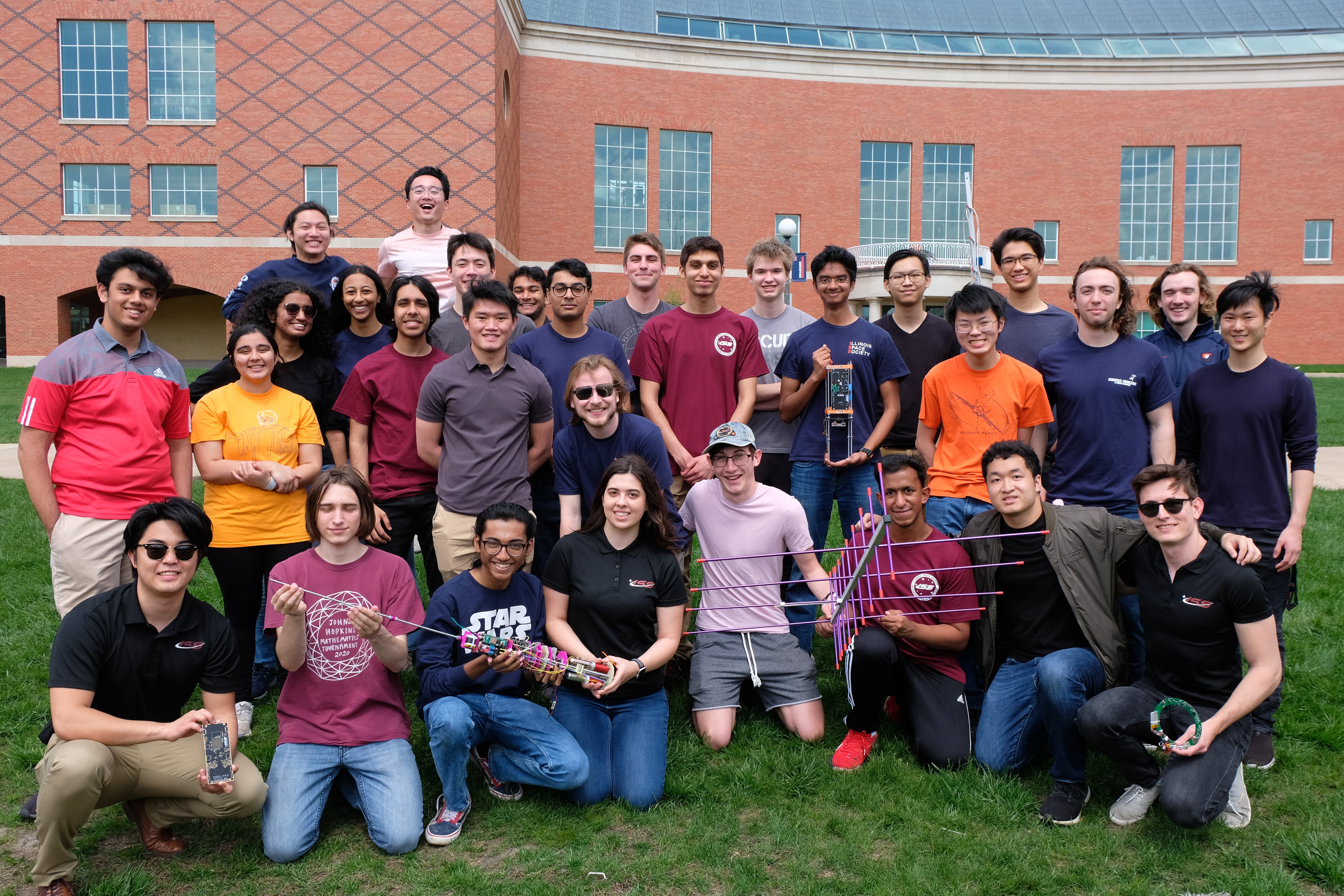 Endurance team in front of Grainger Library. Chigullapalli holding the avionics bay.