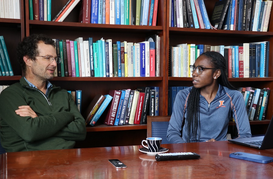 AE Department Head Jonathan Freund meeting with Chy-Amari Finley about her research.