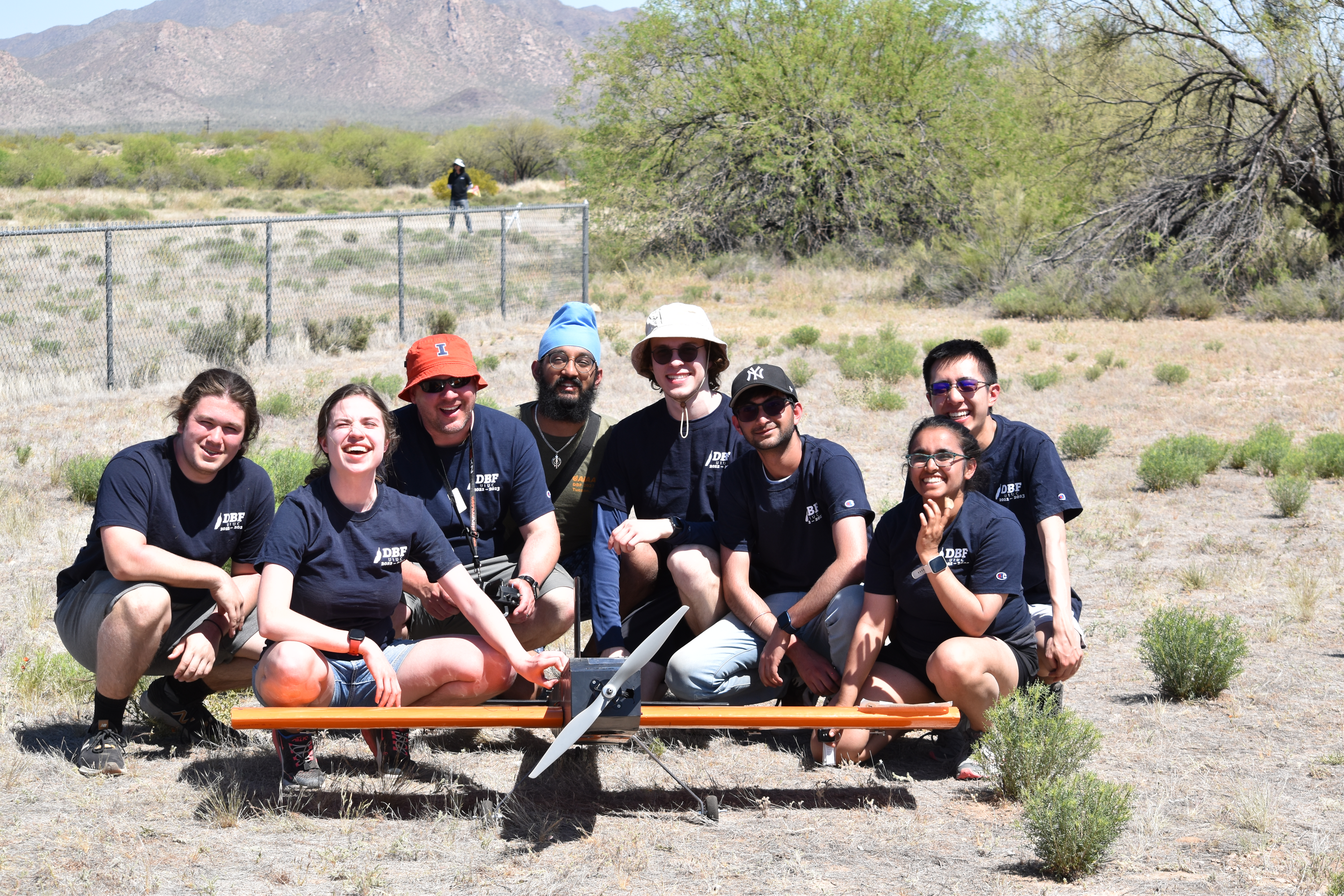 (Left to Right):  AE sophomores Aidan Menees (CAD lead) and Mary Cunningham (propulsion lead); AE Professor, DBF adviser, and pilot-in-command Jason Merret; AE juniors Jessy Singh (build lead) and Michal Marciniak (treasurer); AE sophomore Tushar Khosla (flight test lead engineer); and AE seniors Shirley Shah (team lead and president) and Jeremy Lau (mission systems lead) Additional members of this year&acirc;&euro;&trade;s DBF team who could not make the trip to Arizona: Christopher Colletti and Elias Waddington (graduate student advisers), Henry Camp (aerodynamics engineer), Nicole Orloff (technical writing lead), Vivek Nair (CAD engineer), Sebastian Serratos (CAD engineer), and Eric Chiang (manufacturing engineer)