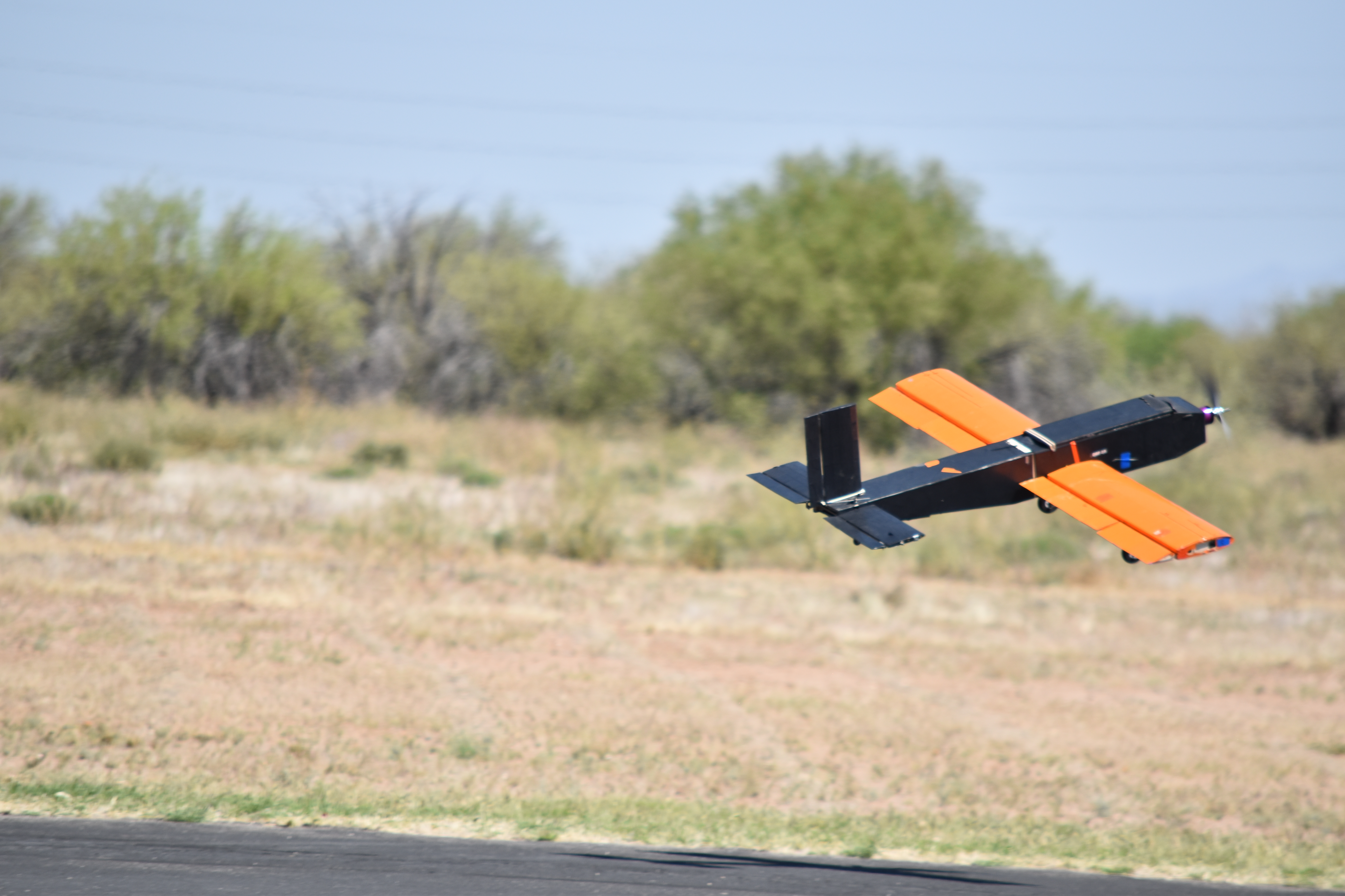 Design Build Fly's 2023 plane in flight at the competition in Arizona.