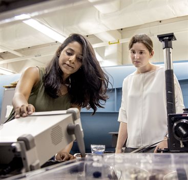 Aadhy Parthasarathy, Ph.D. â€™23, and Theresa Saxton-Fox in the Aerodynamics Research Laboratory