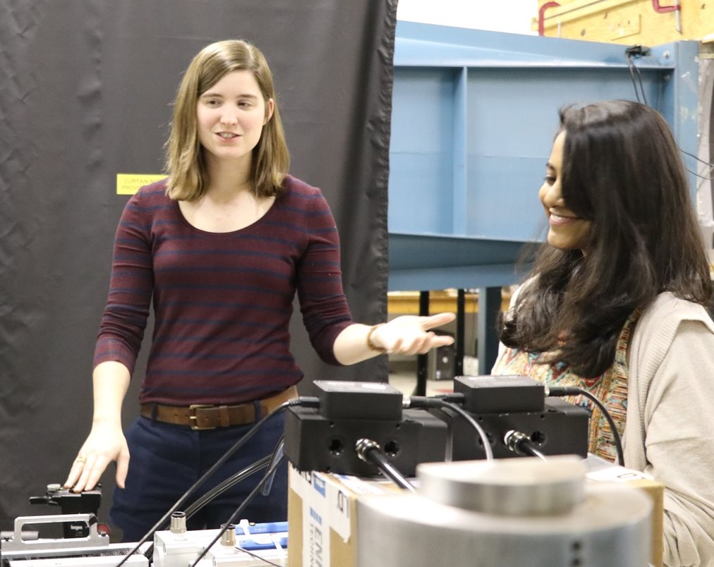 Theresa Saxton-Fox left, working in the aerospace lab with former student Aadhy Parthasarathy, Ph.D. &rsquo;23