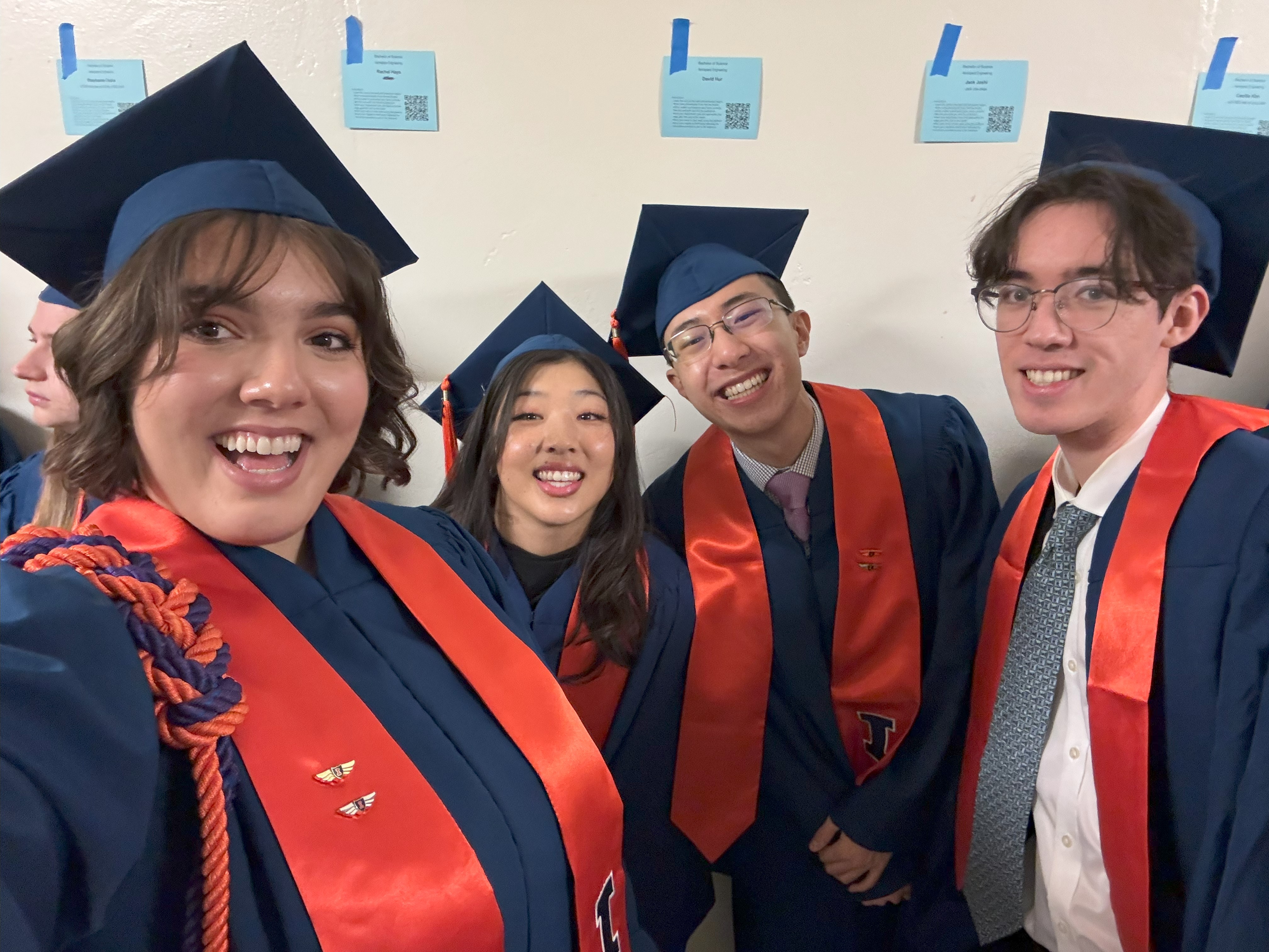 At December commencement ceremony, aerospace graduates left to right: Stephanie Dutra, Cecilia Kim, Jeremy Lau, and Geoffrey Basinger