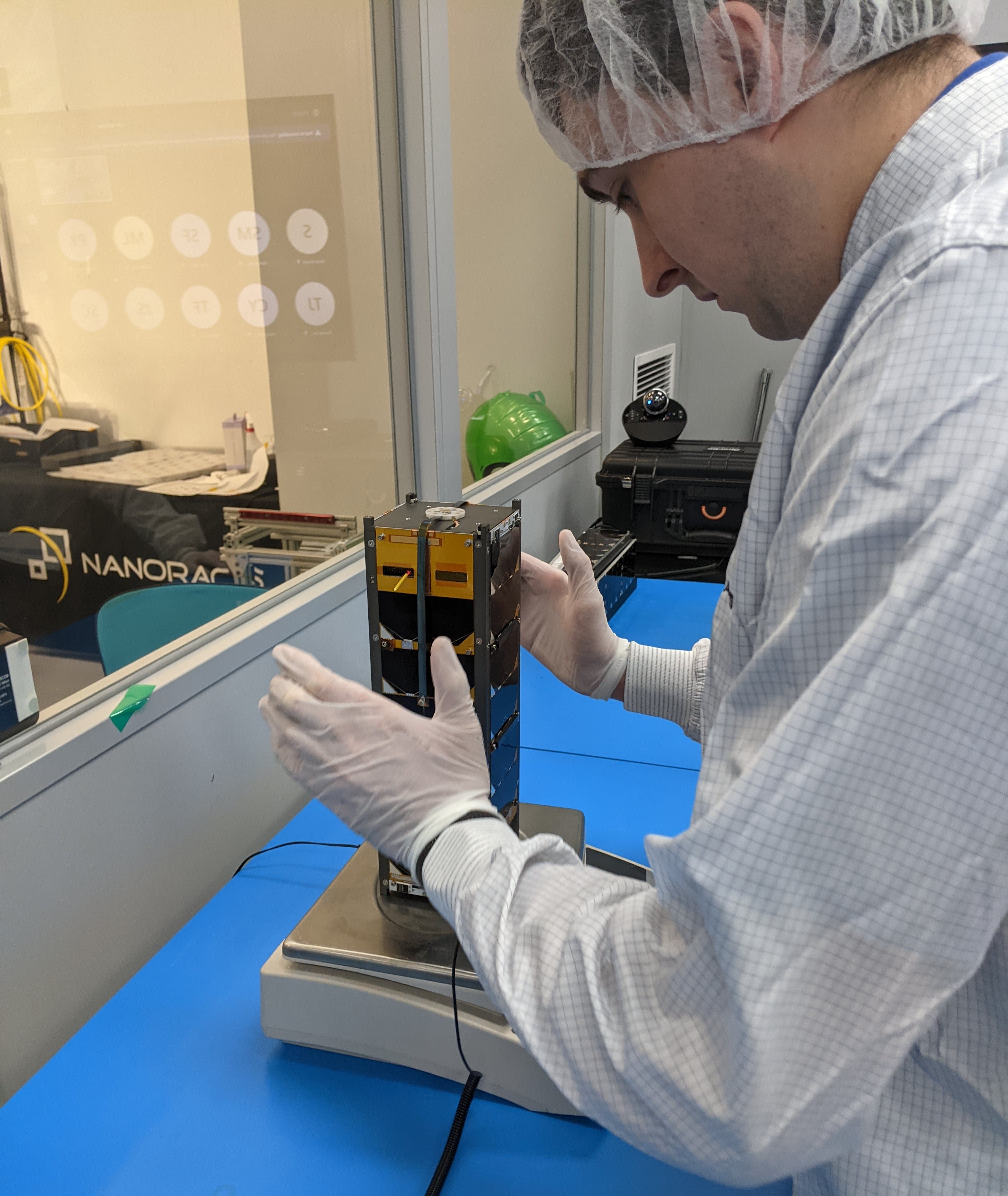 Rick Eason with the Cool Annealing Payload Satellite, or CAPSat