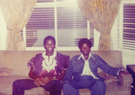 Seated left with Victor Jonathan is his friend from Nigeria Tunde Olutade, who placed second in their class at Mayflower Secondary School. Olutade was briefly enrolled as an engineering student but left to pursue medical school. He became a nephrologist.