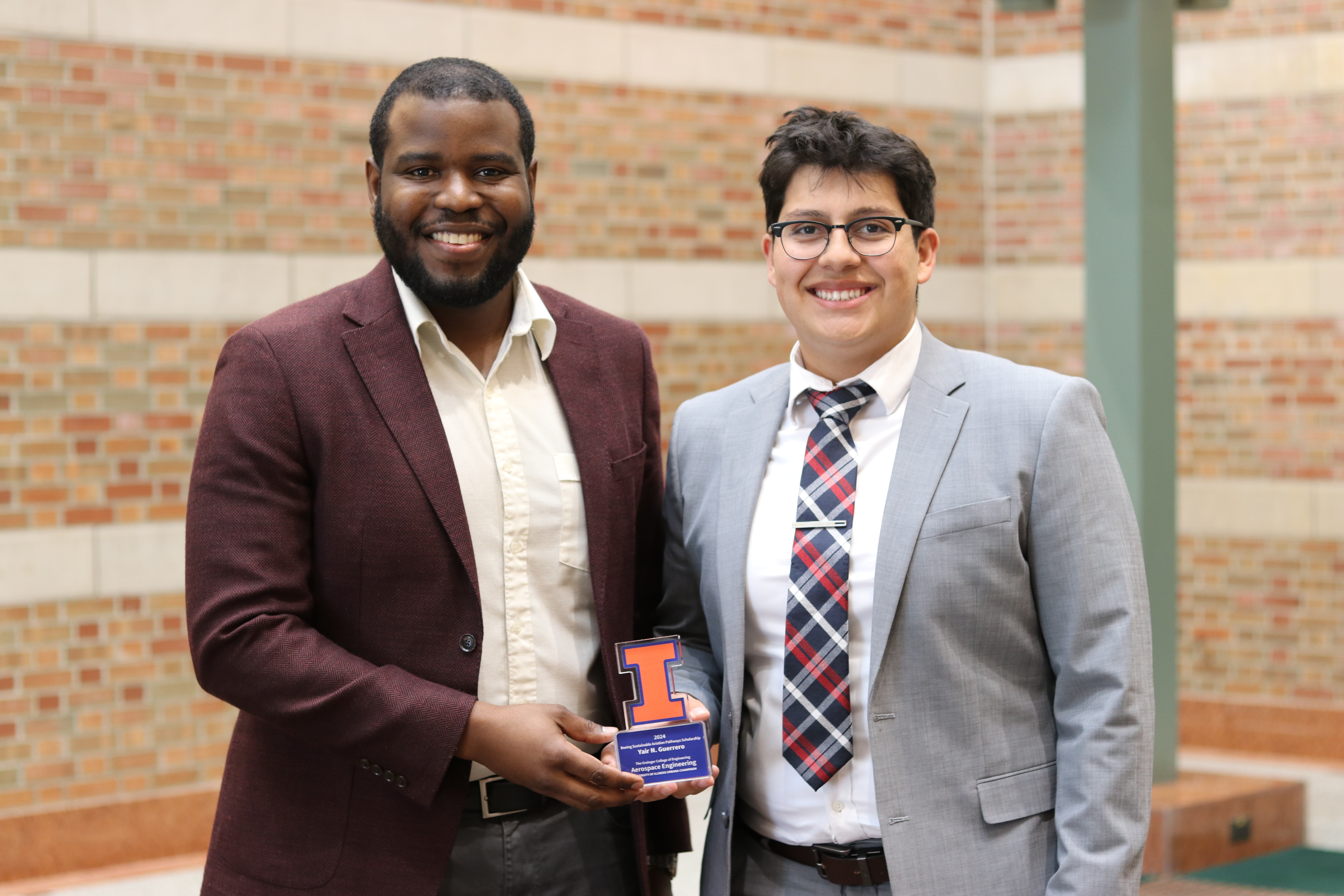 Matthew Clarke, left, with Yair Guerrero at a spring 2024 a