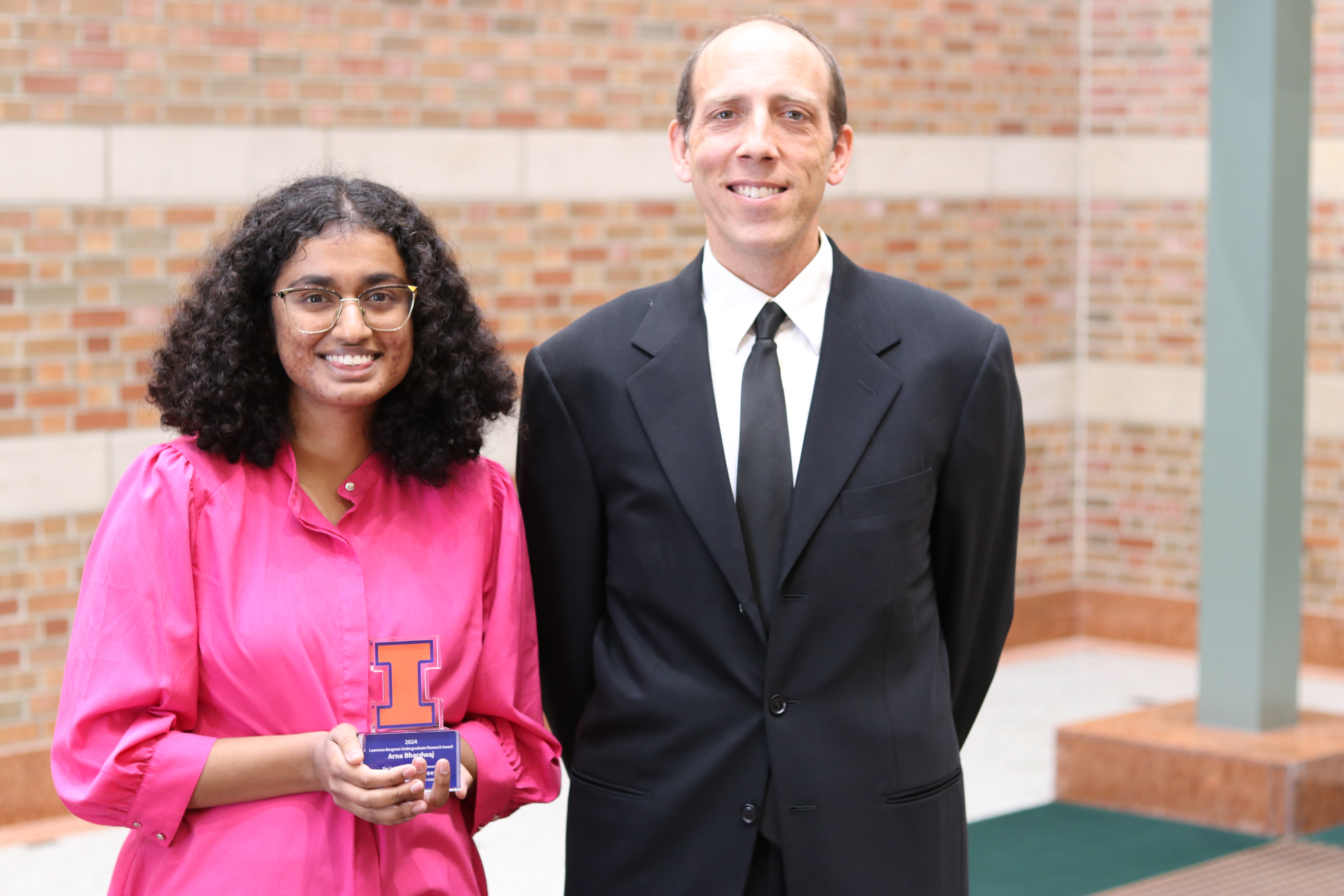 Arna Bhardwaj and Tim Bretl after receiving the Lawrence Bergman award for Excellence in Undergraduate Research in 2024