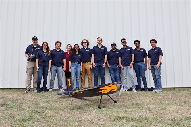 DBF members at the competition in Wichita and their roles from left to right: Professor Jason Merret, faculty adviser and pilot; Nicole Orloff, technical writing lead; Aidan Menees, aerodynamics lead; Mary Cunningham, propulsion lead; Katie Lee, mission systems lead; Michal Marciniak, president; Justin Abel, build member; Tushar Khosla, flight test lead; Tyler Gralewski, purchasing lead; Vivek Nair, CAD and build member; and Sebastian Serratos, CAD lead.