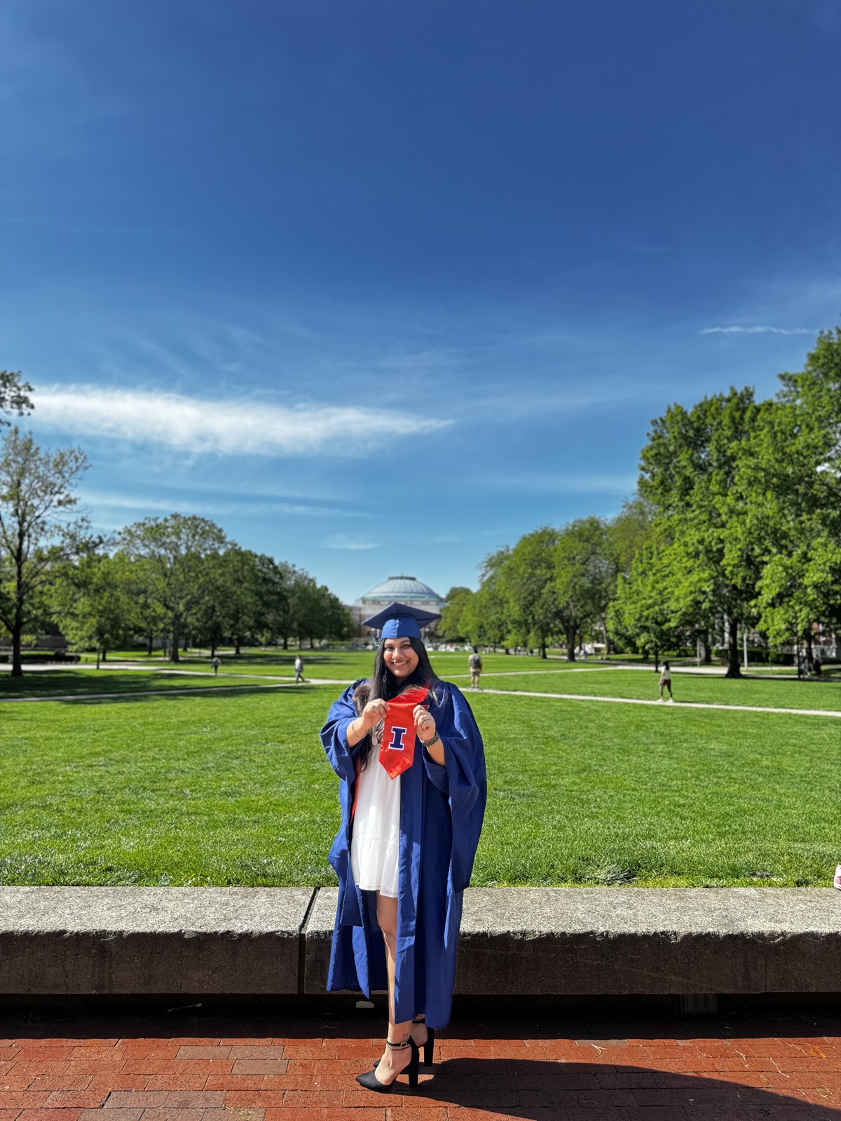 Angel Agrawal on the main quad with Foellinger Auditorium behind her