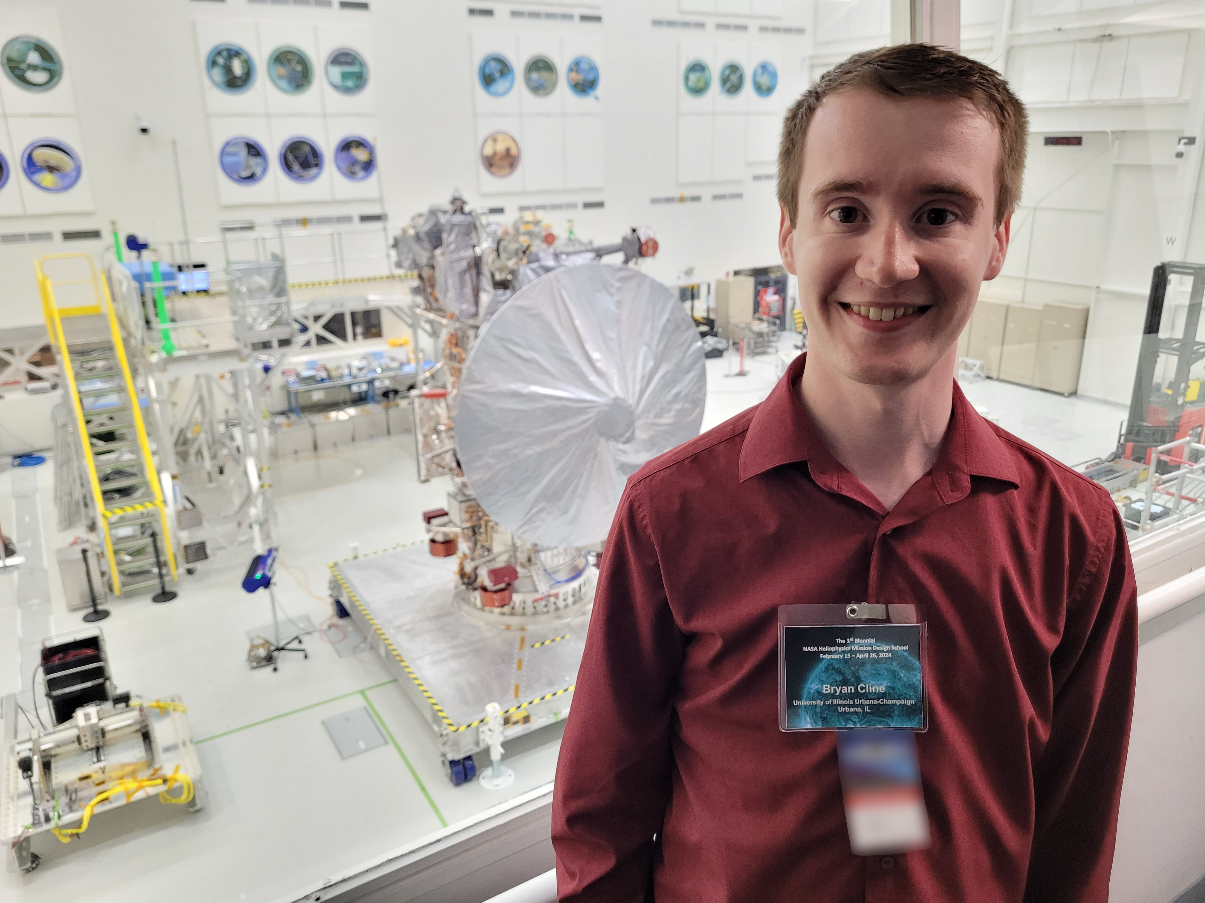 On one of the JPL tours, Cline stopped at the observation deck of the Spacecraft Assembly Facility that overlooks the complete Europa Clipper spacecraftâ€”with the exception of the solar panels which will be installed at the Kennedy Space Center before its launch in October.